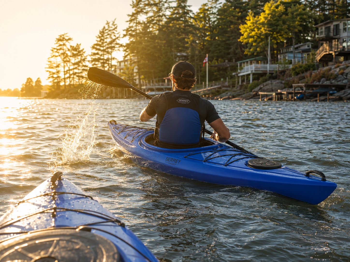 Paddler heading out at golden hour along the shoreline