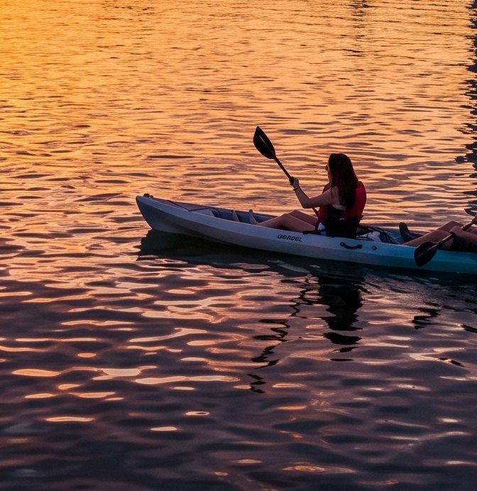 Paddlers heading out at sunset on Provincetown Harbor